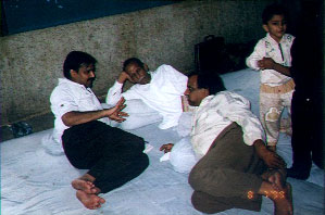 Lalit jeejajee & Subhash chachaji in conversation,  while Madanlal dadaji relaxes 