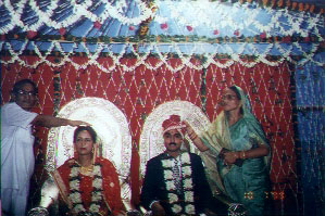 Papaji and Mummyji bless the couple