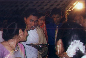 Naresh bringing in the bride for varmaala